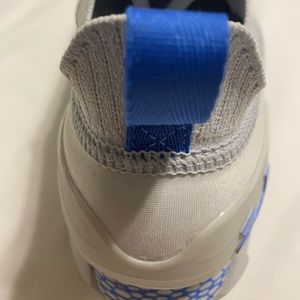 Under armor White with blue trim Tennis shoes